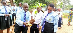 Old students planting trees during their recent visit to Mbale SS on 4th Aug 2023