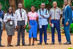 Old students posing for a phot moment